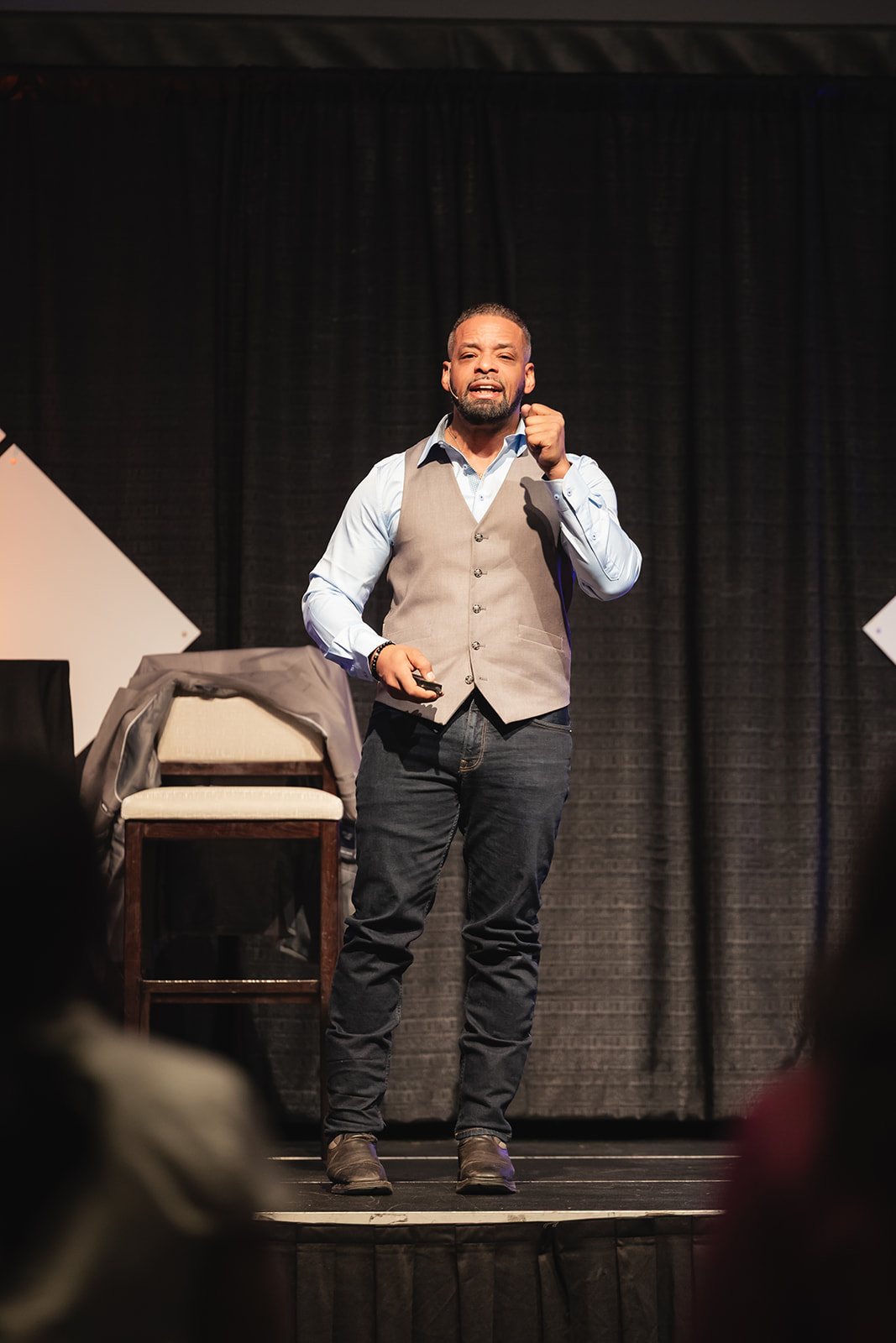 Dr. Stephen Crawford speaking with conviction during a live keynote